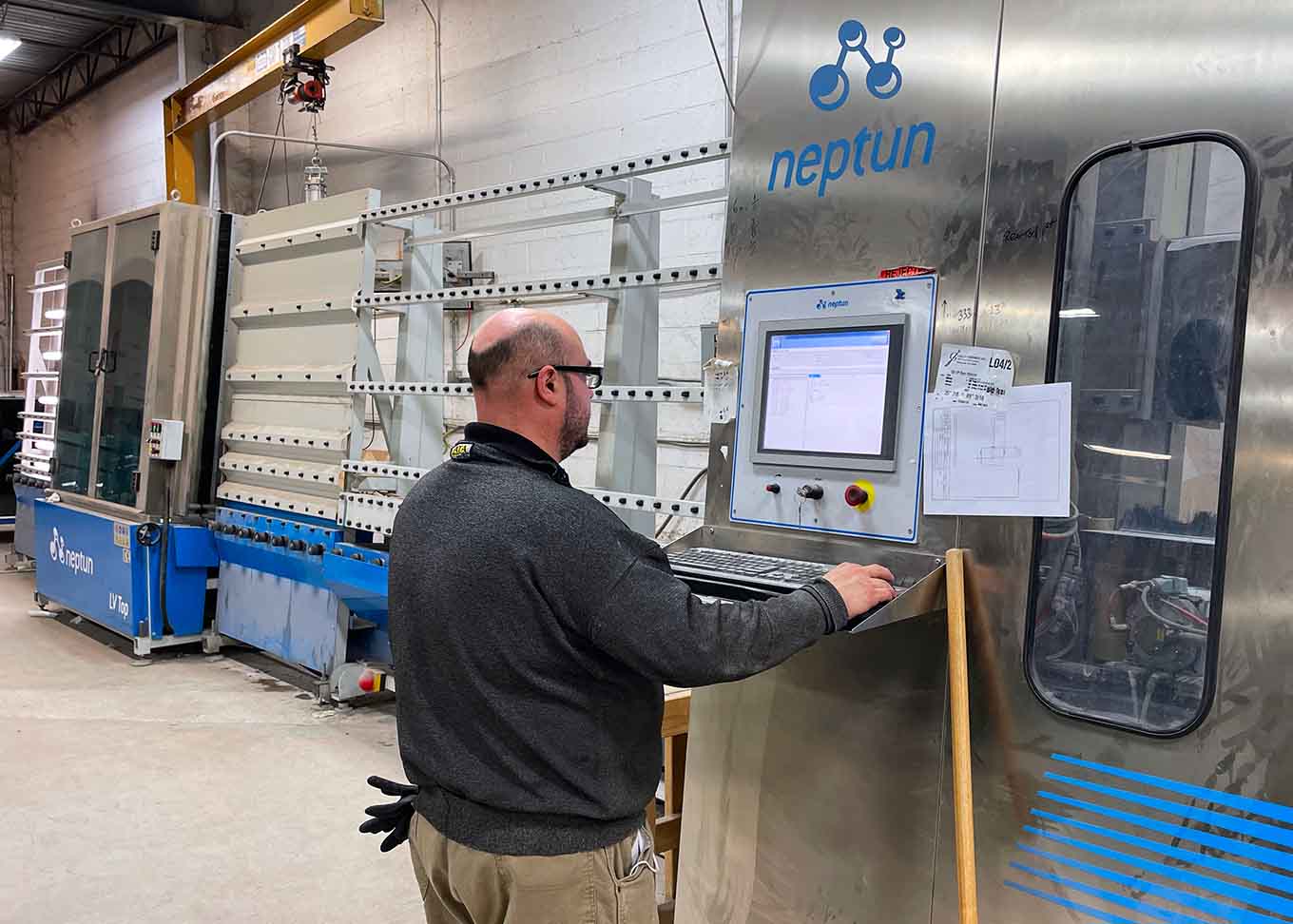 employee using glass manufacturing technology