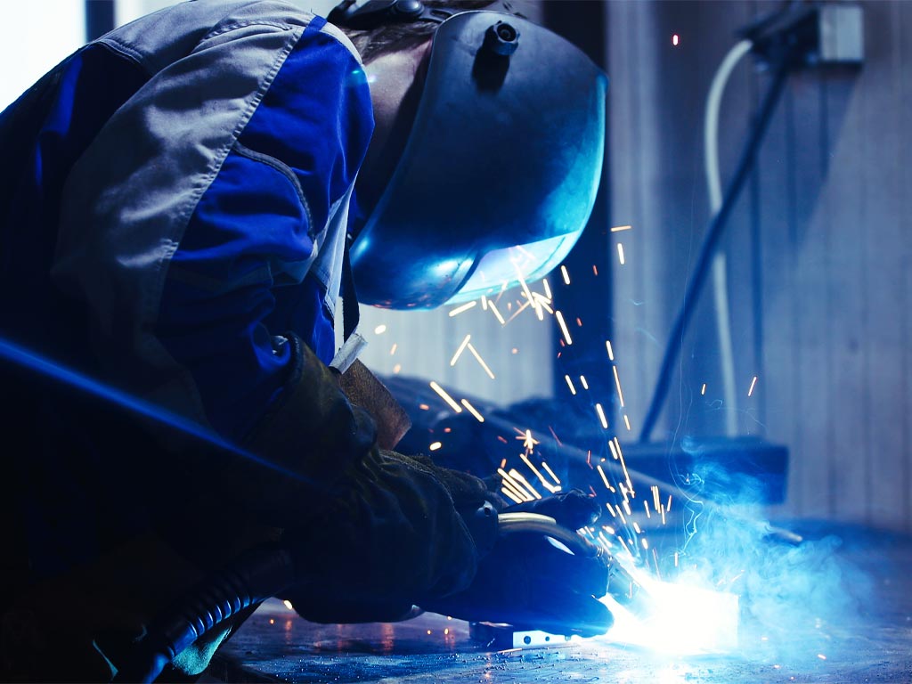 metal fabrication worker in industrial factory